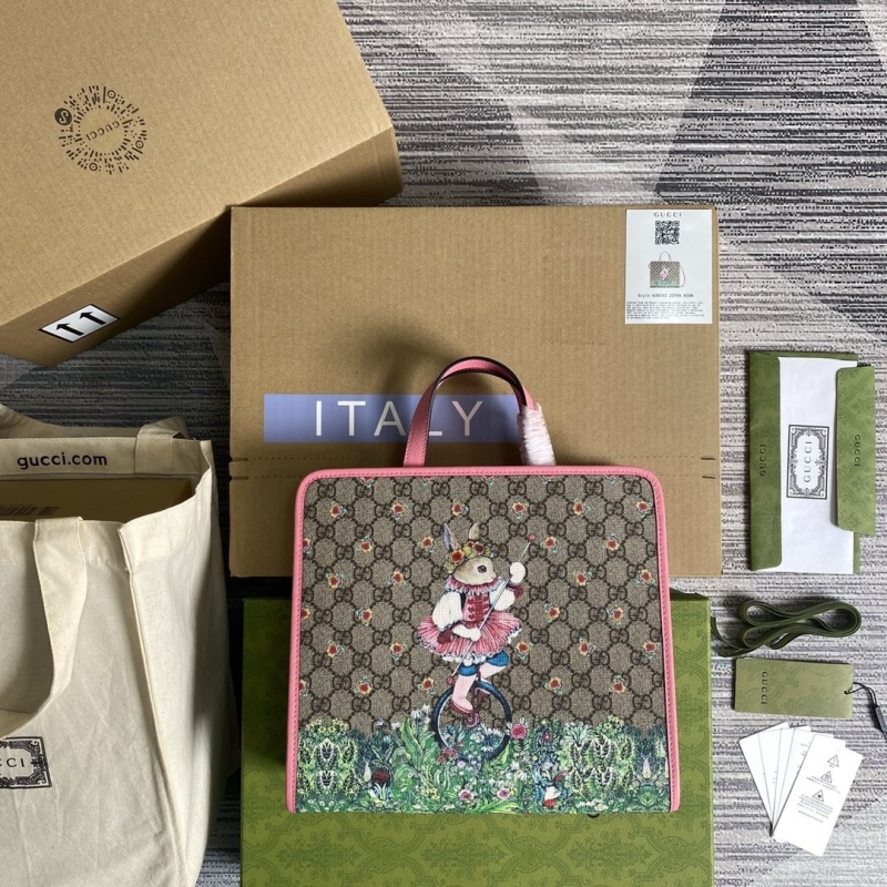 G*u*i shopping bags